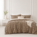 Brown tufted comforter set on a bed