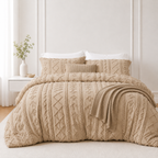 Khaki tufted comforter set on a bed