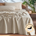 Beige European linen sheet set on an oak bed