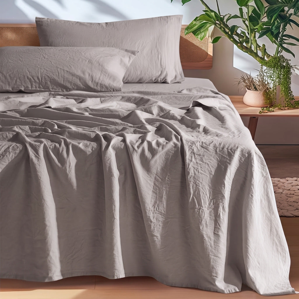 Gray European linen sheet set on an oak bed