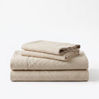 Folded stack of Beige European linen sheets