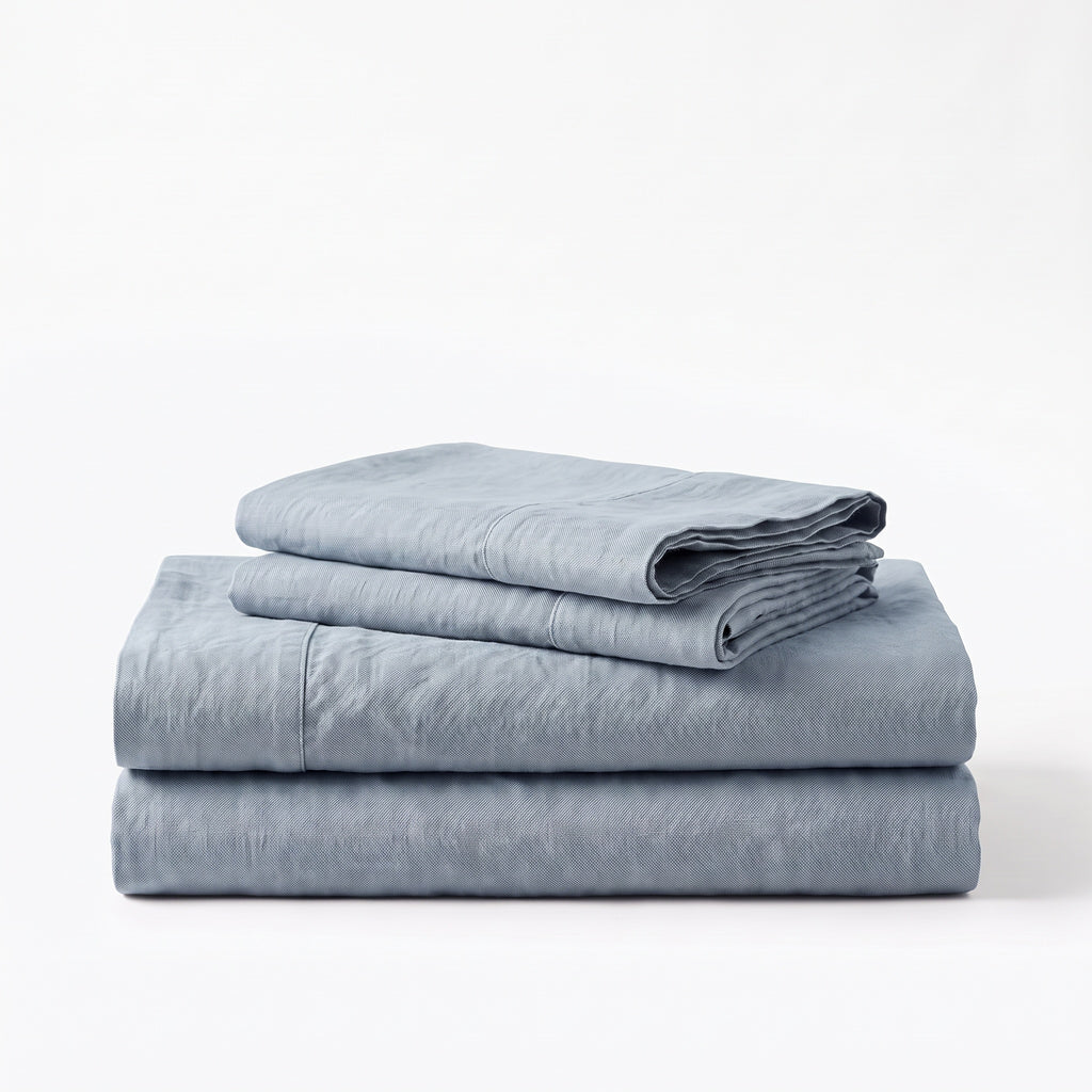 Folded stack of Blue European linen sheets