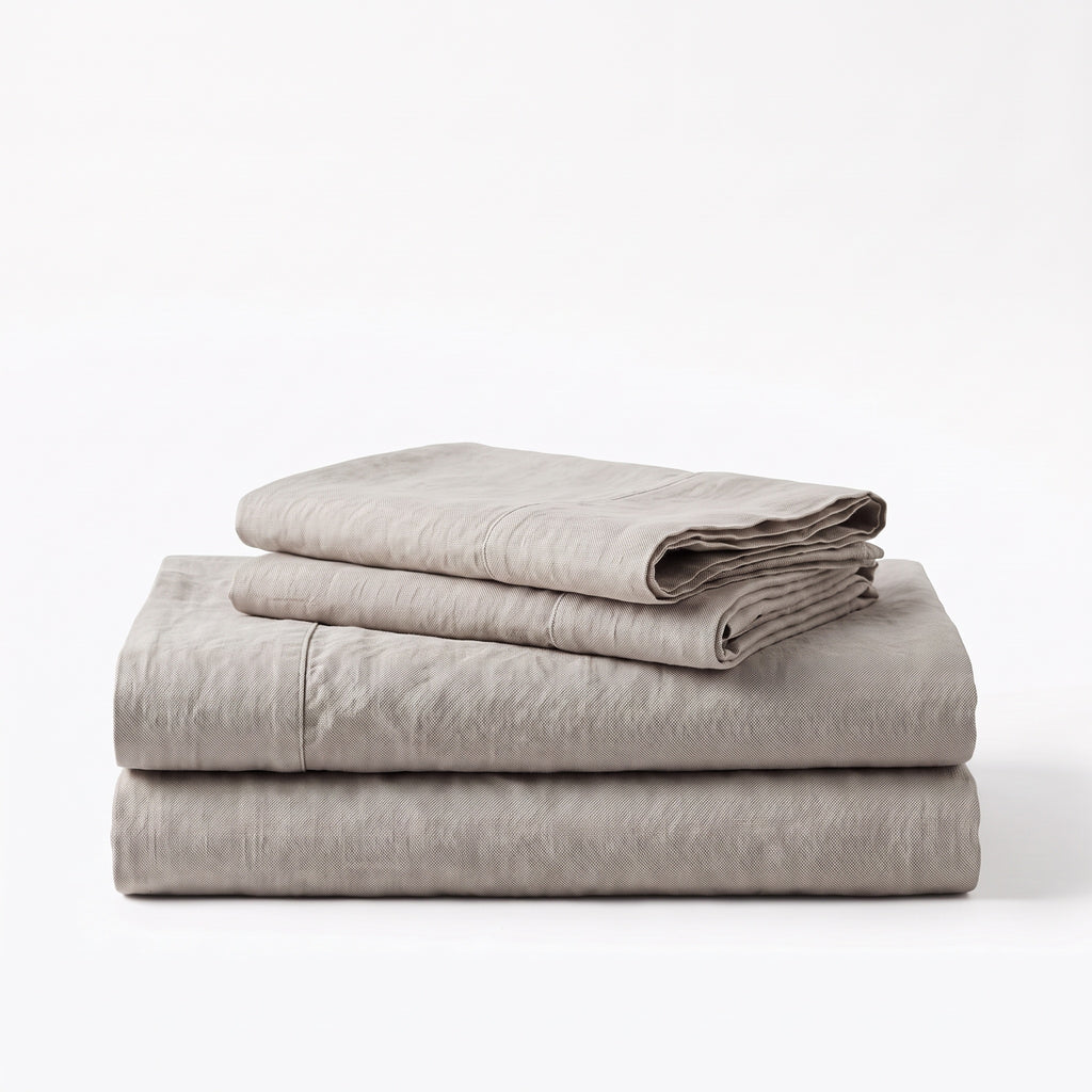 Folded stack of Gray European linen sheets